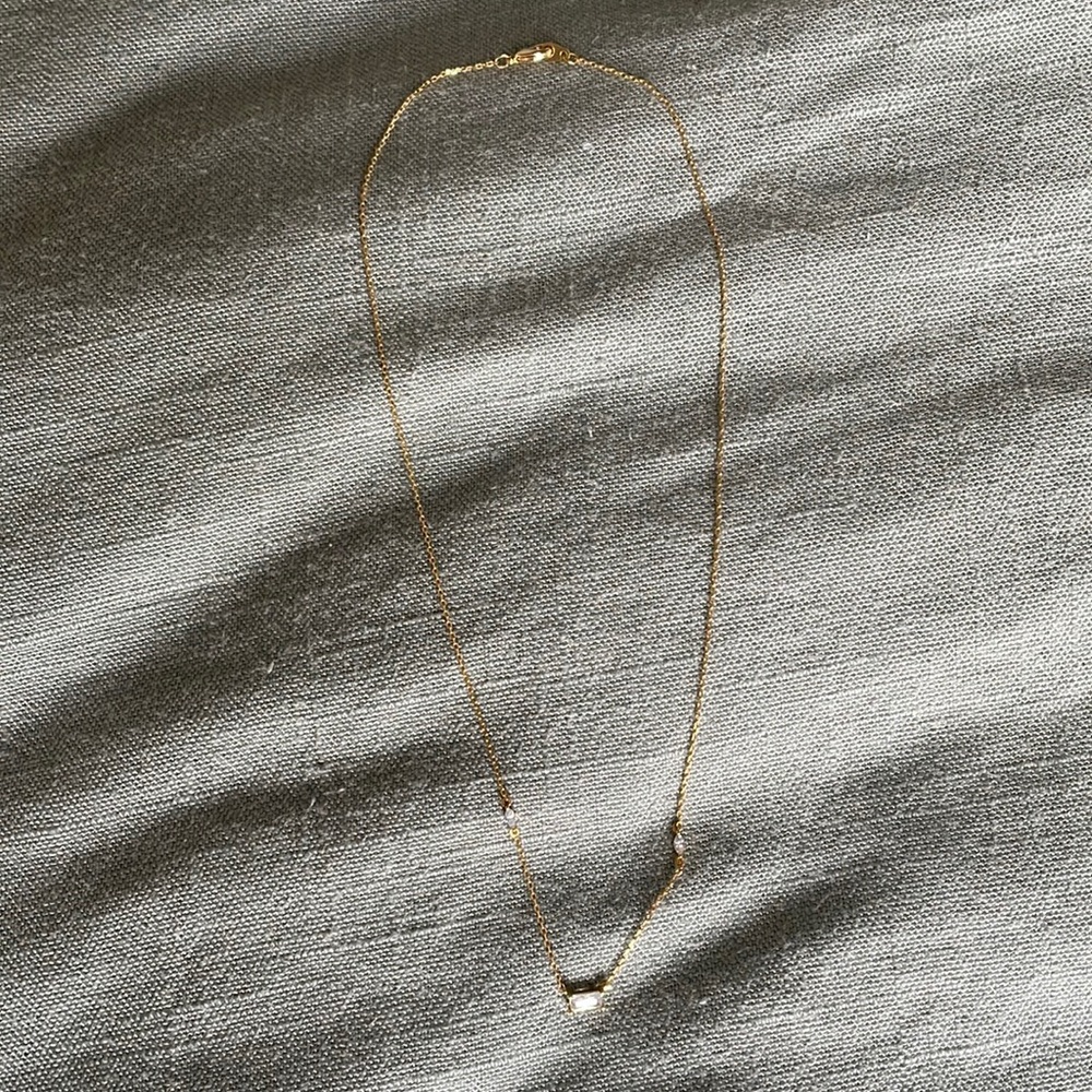 Cubic zirconia and gold tone necklace
